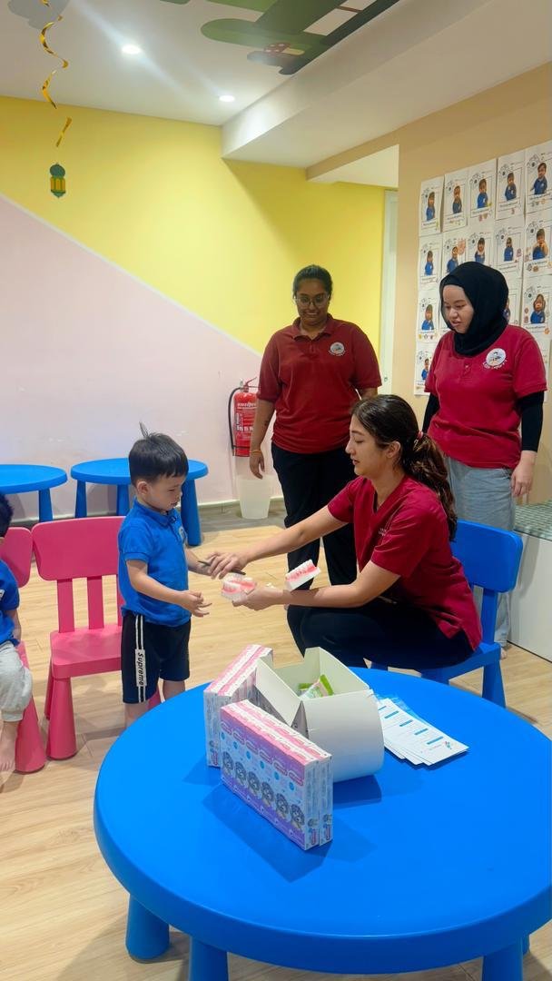 Qualiteeth team at a school oral health visit